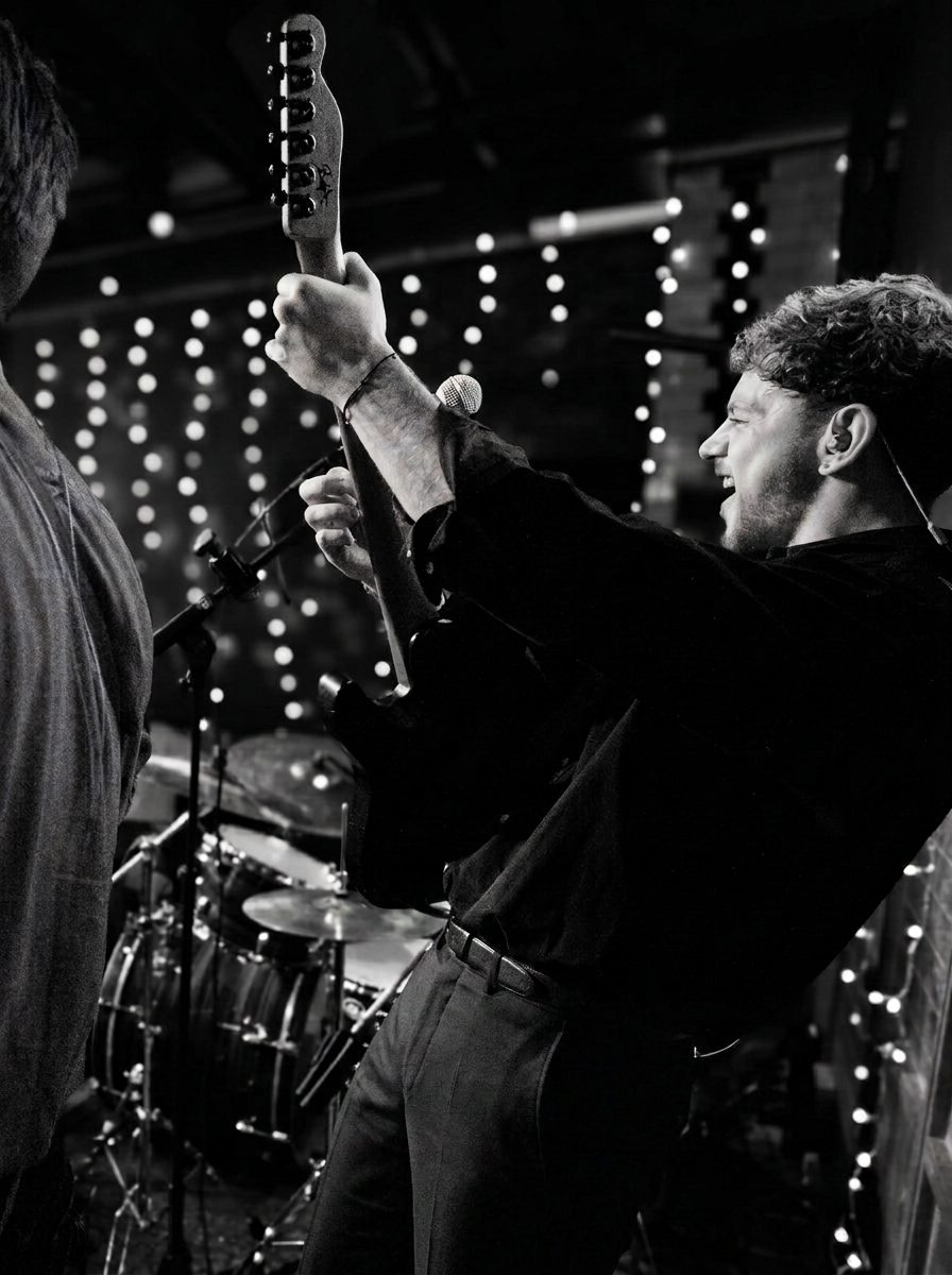 Voulez Groove band member on stage