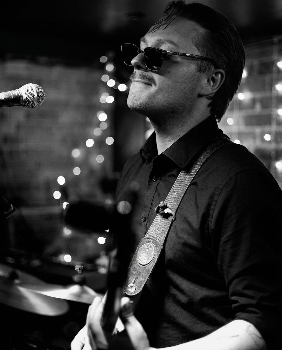 Voulez Groove band member performing at a corporate event