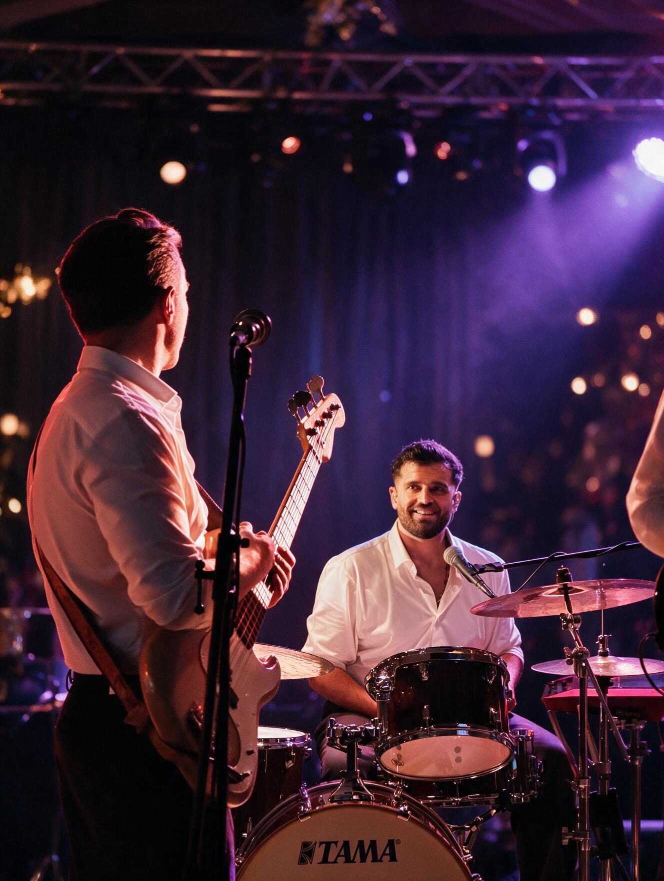 Voulez Groove bassist and drummer performing live